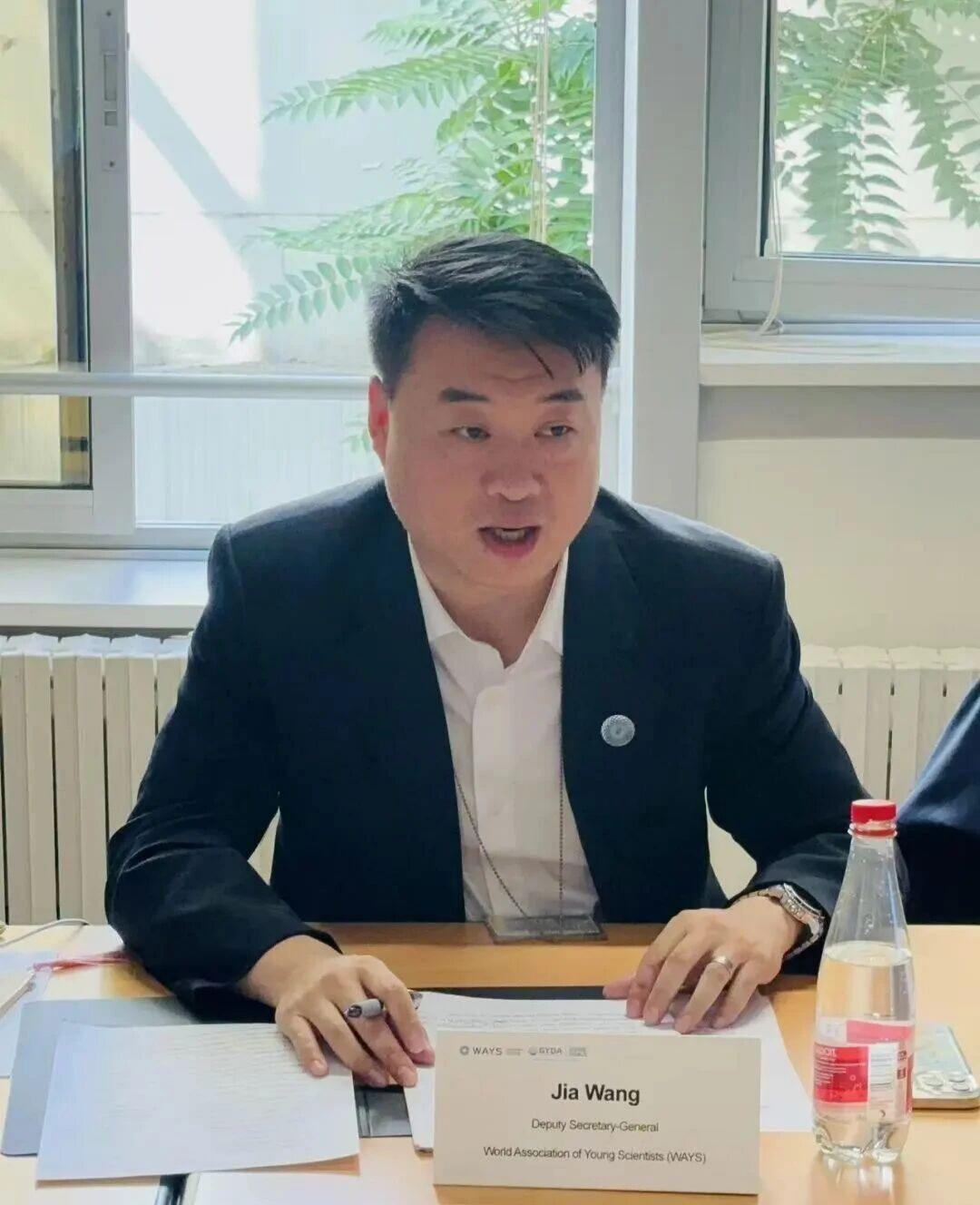 Jia Wang delivering formal address